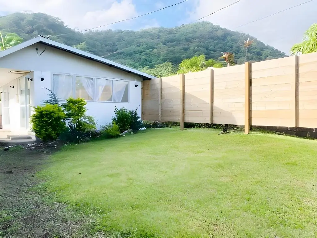 Apia Inn property with mountain views